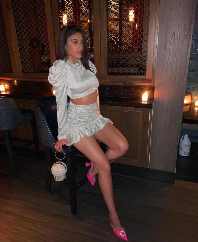 Impeccably Feminine elegant and vivaciously fun loving